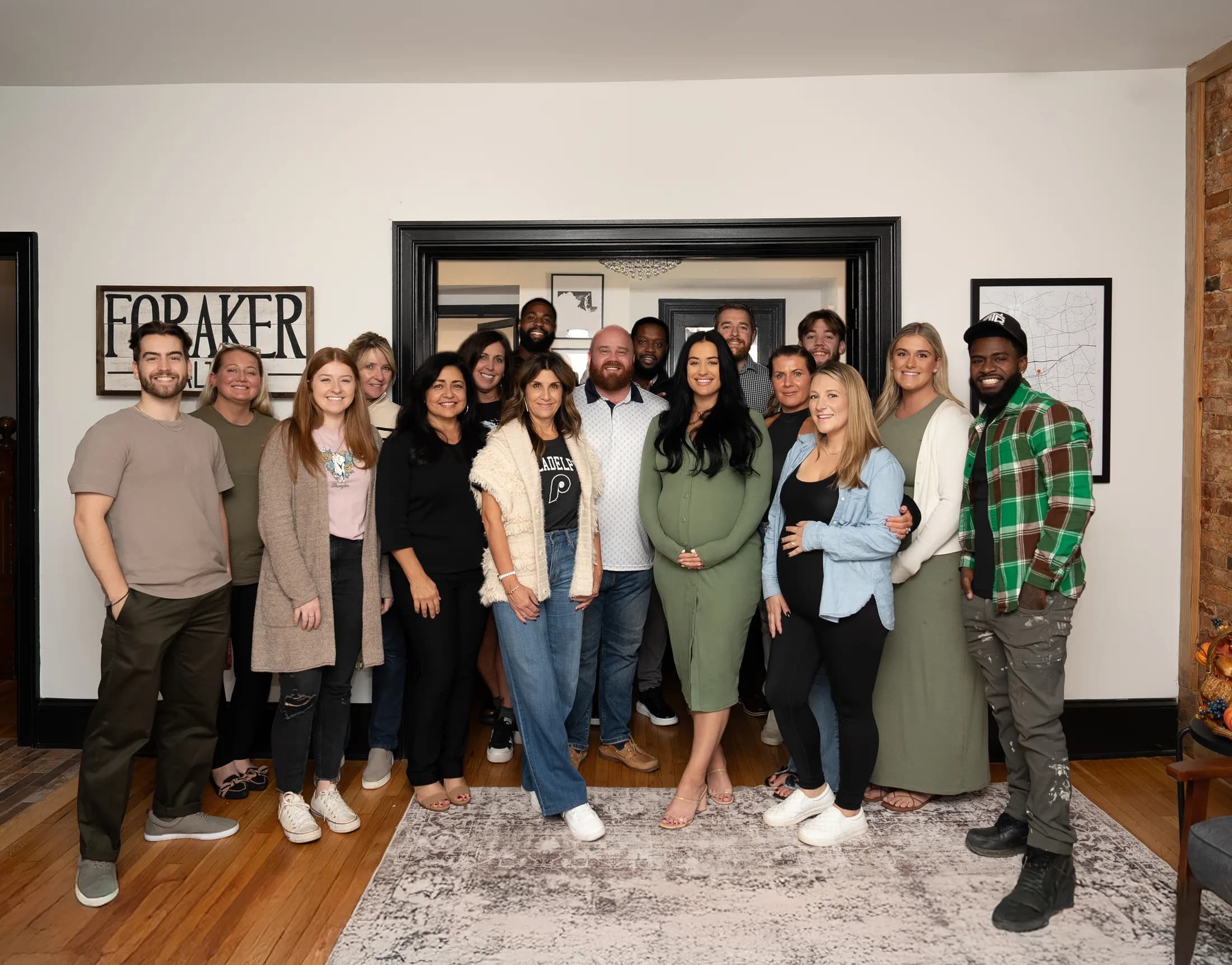 Foraker Realty Co. agents and staff celebrating together at the office