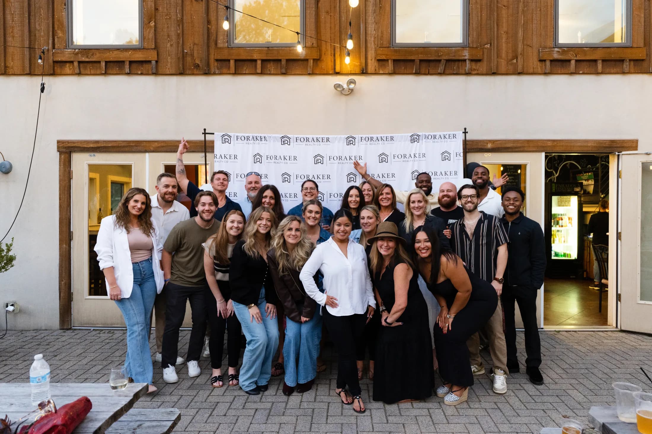 Foraker Realty Co. agents and staff at an evening team event